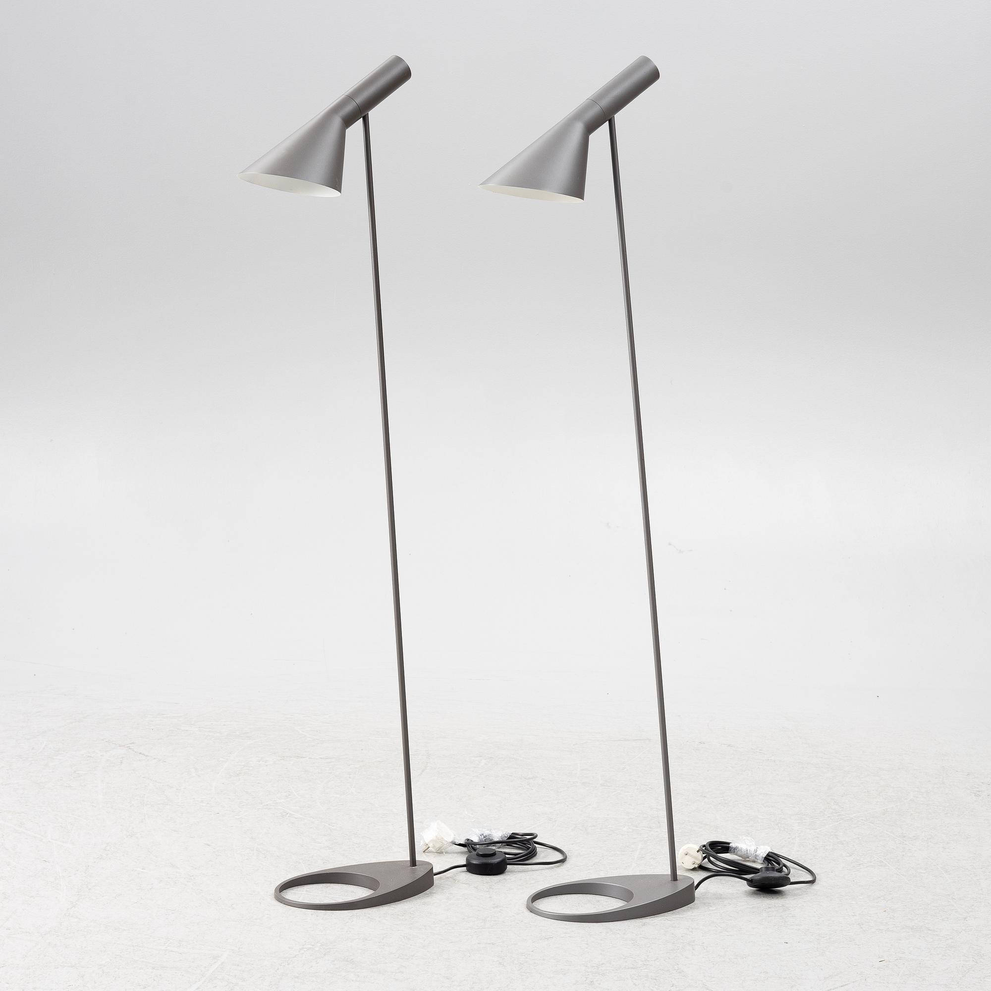 Arne Jacobsen, a pair of 'AJ' floor lamps, Louis Poulsen, Denmark.