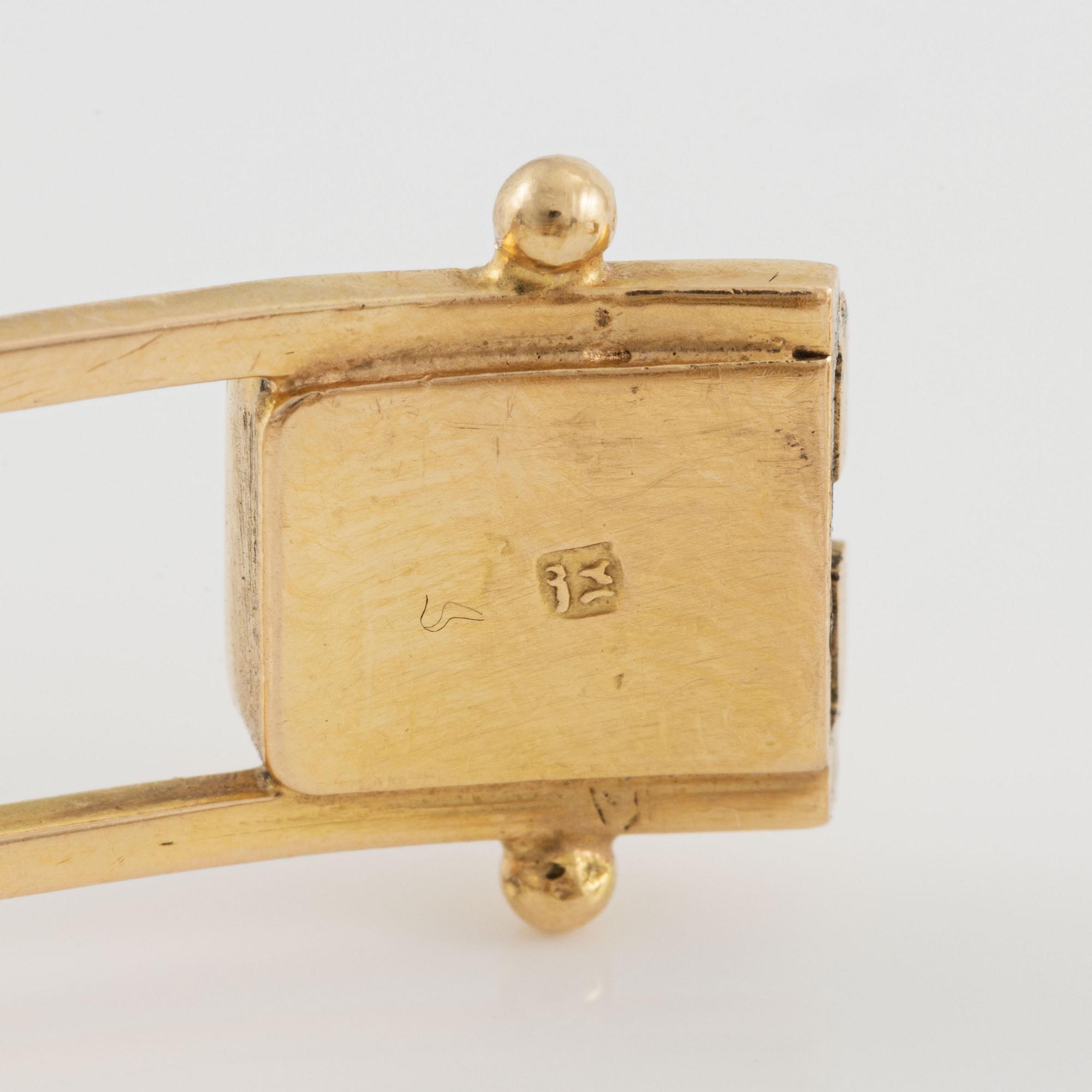 Armband 18K guld med fasettslipad kvarts.