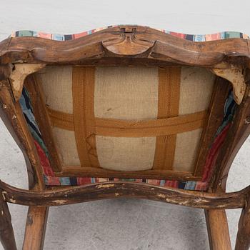 A roccoco armchair, 18th century.
