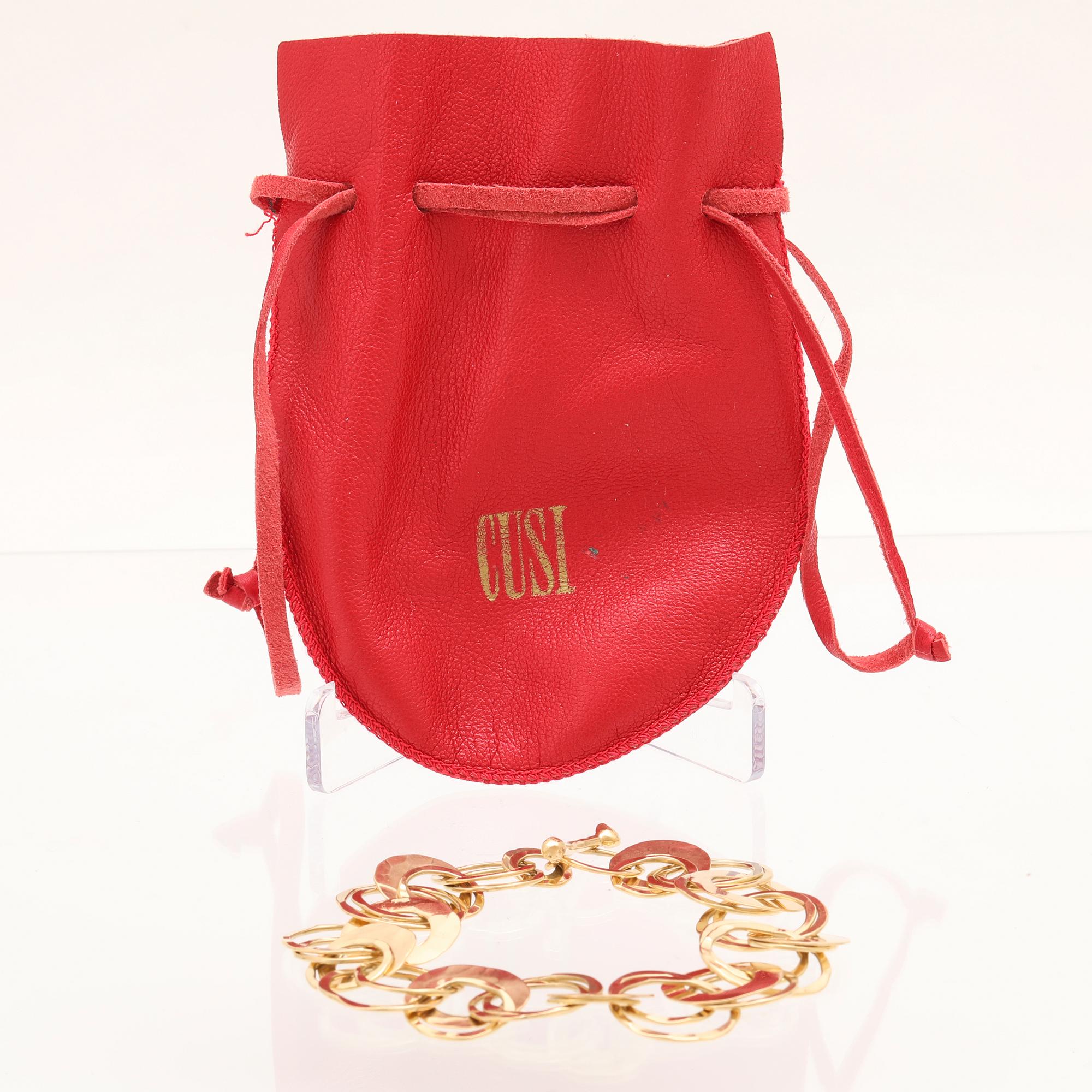 An 18K gold bracelet from Cusi Italy.