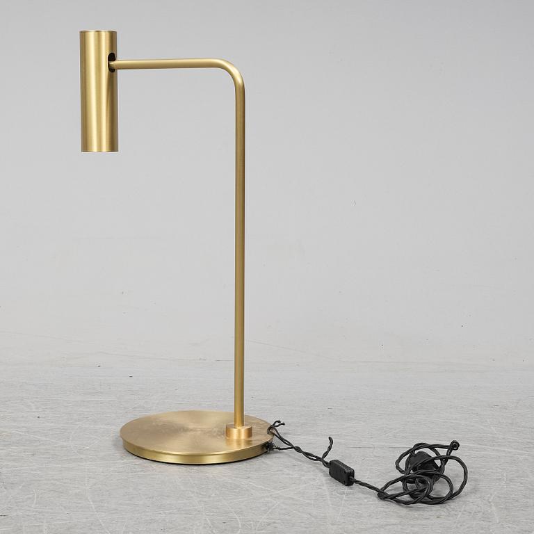 A 'Heron' brass table light by Michael Verheyden for CTO lighting.