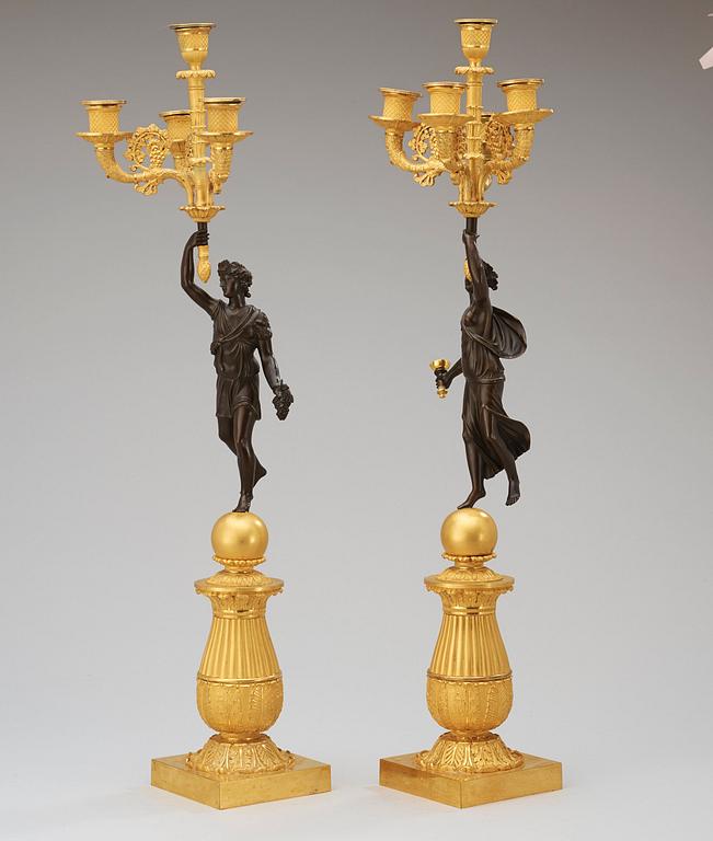 A pair of French Empire early 19th century five-light candelabra.