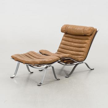 An Arne Norell "Ari" easychair and stool later part of the 20th century.