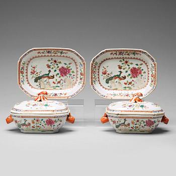 813. A pair of famille rose 'double peacock' butter tureens with covers and stands, Qing dynasty, Qianlong (1736-95).