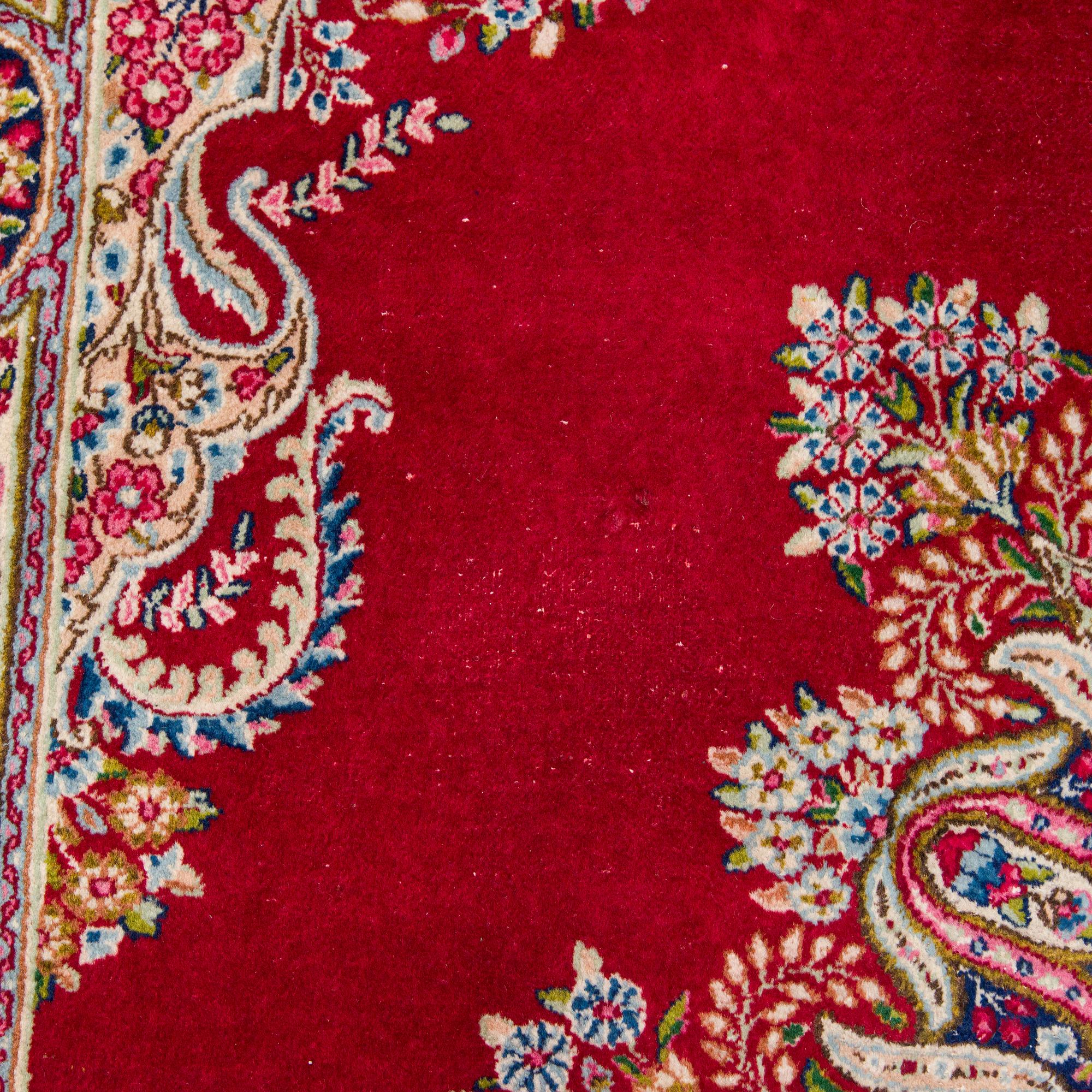 A carpet, Kirman, ca. 333 x 244 cm.
