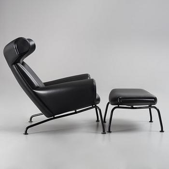 Hans J. Wegner, an 'Ox-Chair' and ottoman for Erik Jørgensen, Denmark, post 1961.