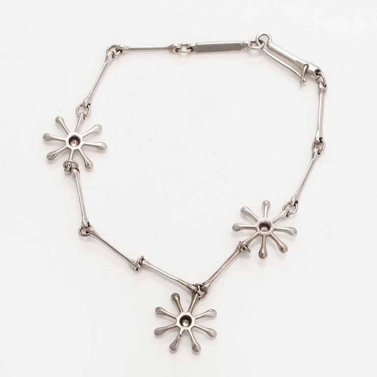 Kalevala Koru, armband, "Polaris", 18K vitguld och briljantslipade diamanter, Kirsti Doukas, 2009.