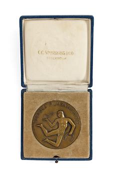 A BRONZE MEDAL,  The Swedish Film Socitey Plaque 1956-57.