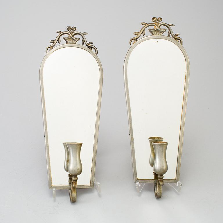 a pair of wall sconces ny Firma Svenskt Tenn in 1928.