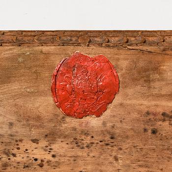 A baroque wedding casket, carved wood, dated 1725.