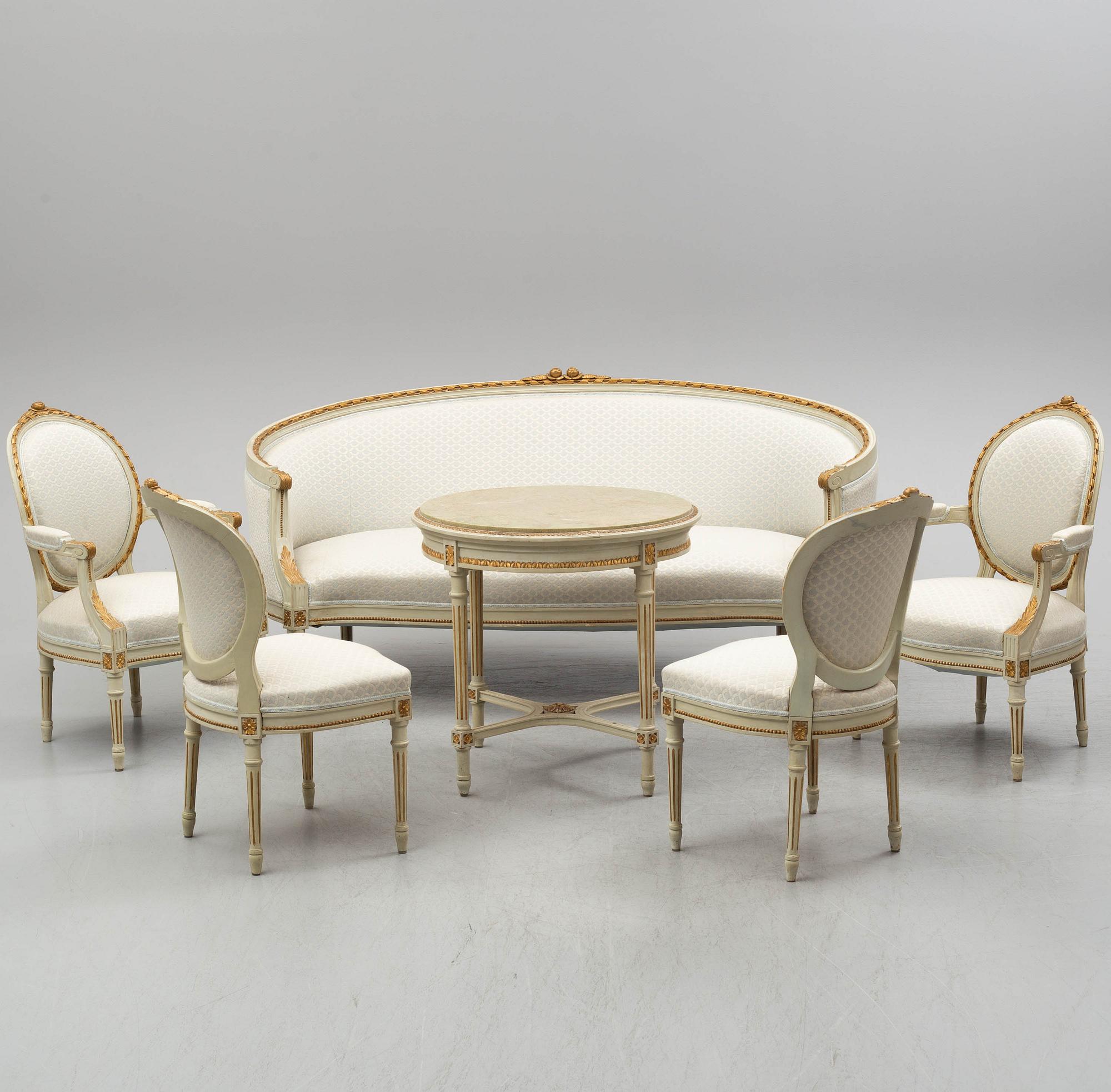 A sofa, four chairs and a table, gustavian style, early 20th century.