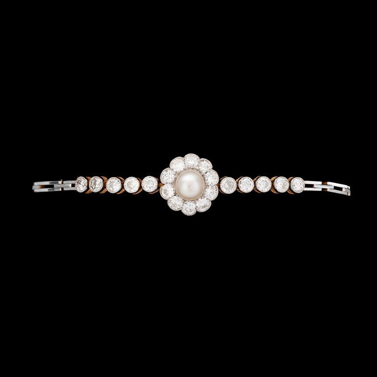 ARMBAND, briljantslipade diamanter, tot. ca 1.60 ct, med orientalisk pärla, 1930-tal.