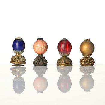 A group of 11 various 'official's hat' finials, Qing dynasty, 19th century.