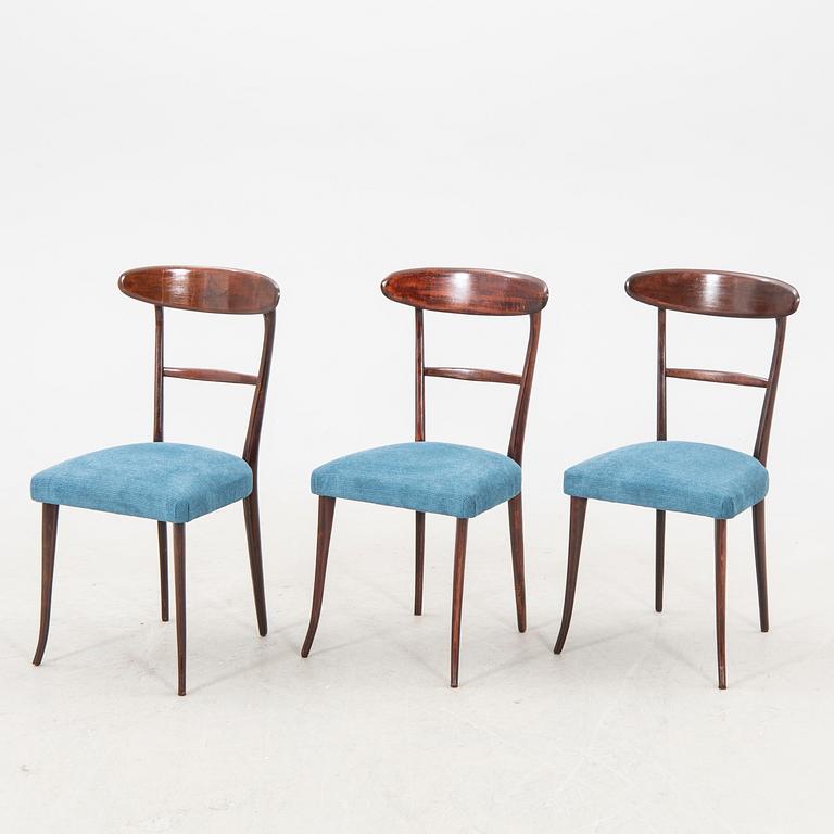 A set of six Italian Mid 1900s walnut chairs.