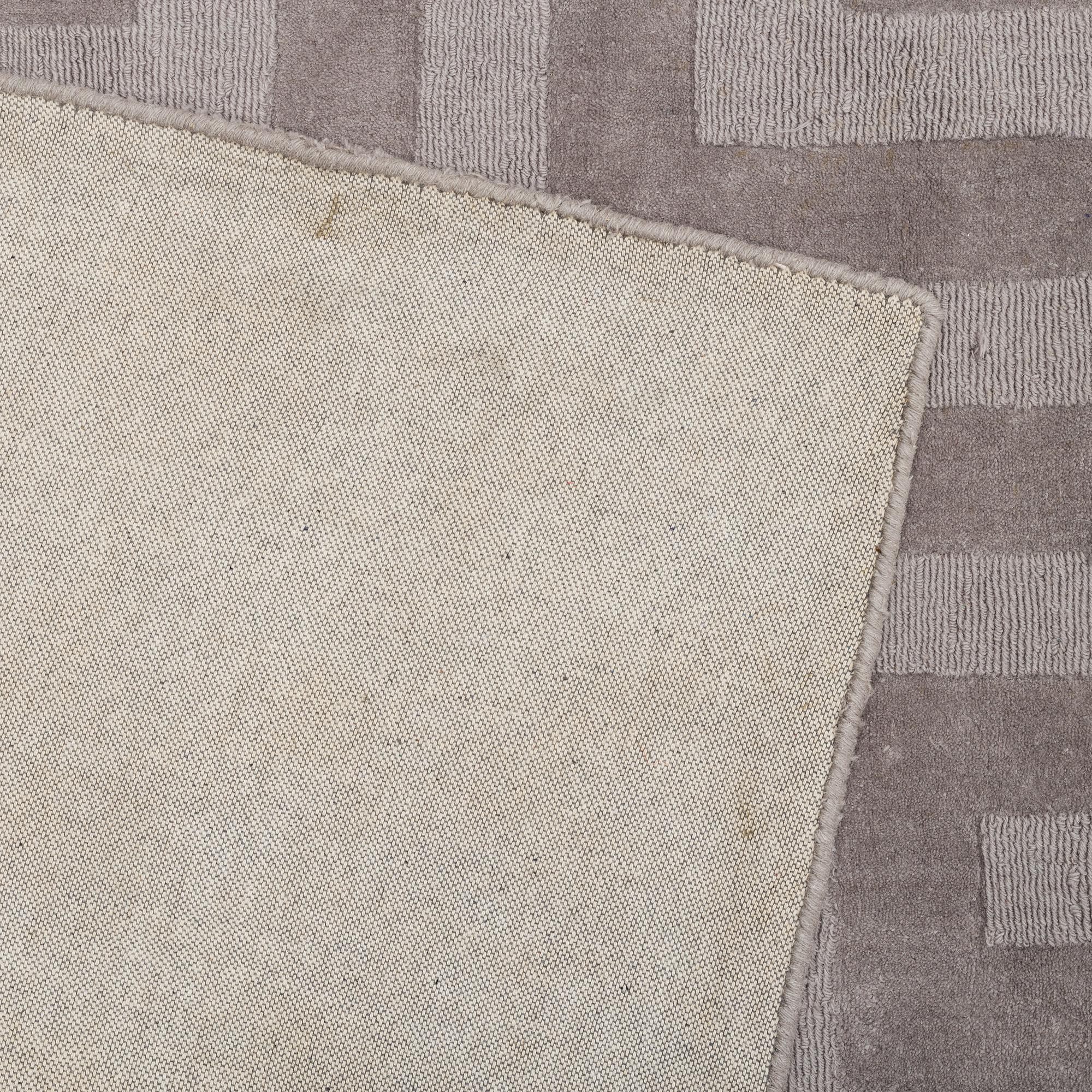A Layered "Wool Cubes" carpet, 390x620 cm.