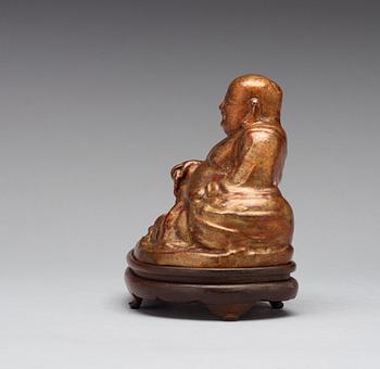 A seated figure of a bronze buddai, 17th/18th Century.
