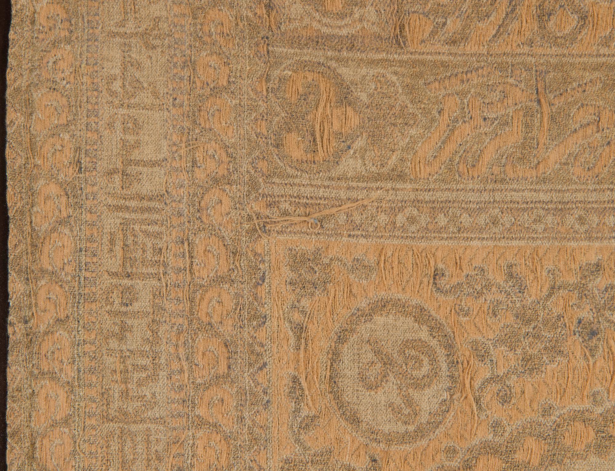 A Framed textile, partially with metallic thread, Ottoman around 1900.