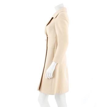 LOUIS FÉRAUD, a light beige wool blend coat, from 1968.