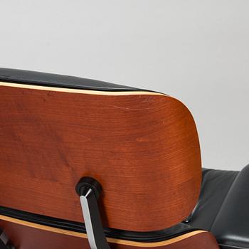 Charles and Ray Eames, a 'Lounge chair' and stool for Vitra 2006.