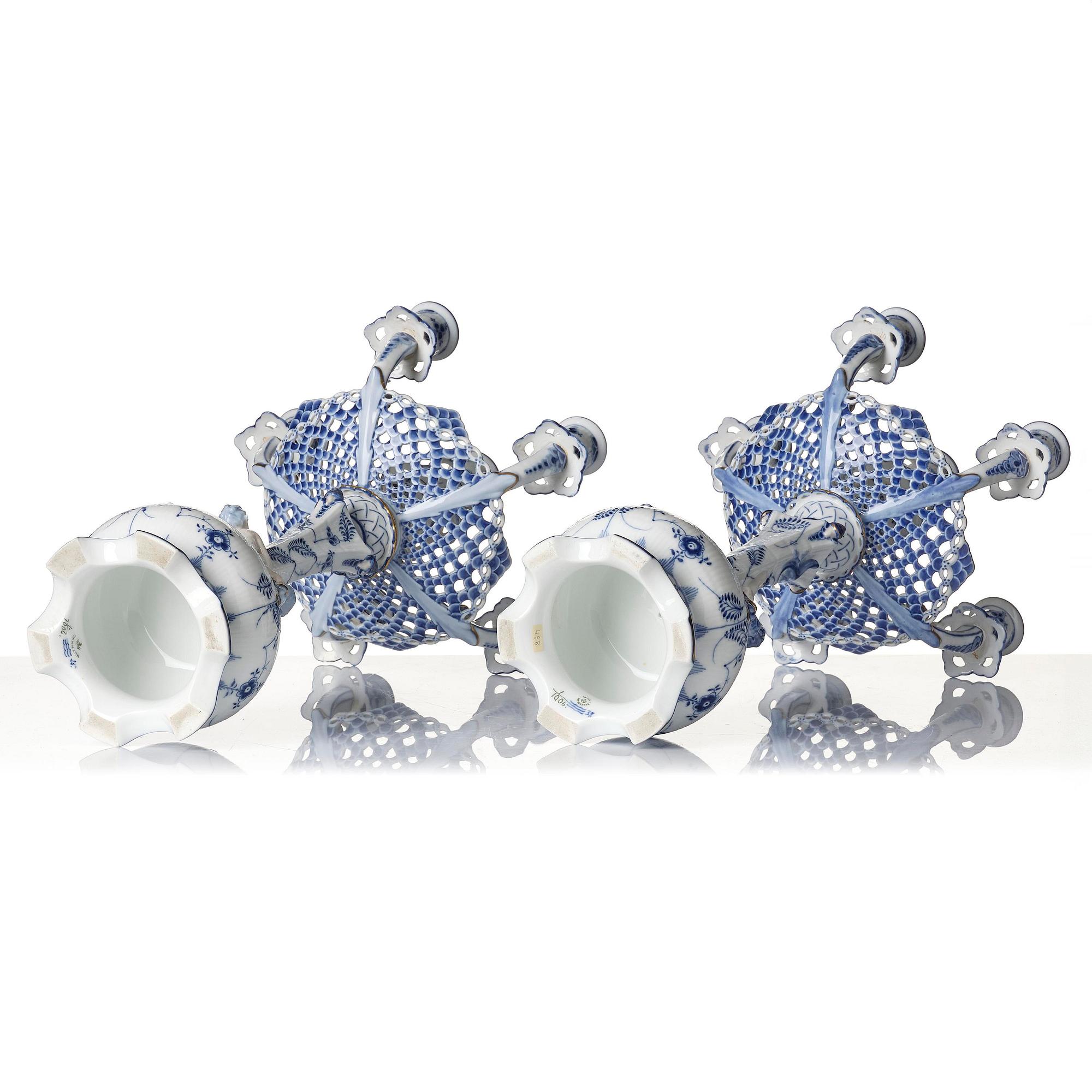 A pair of Royal Copenhagen 'Musselmalet' / 'blue fluted full lace' six-light candelabras, Denmark, 1898-1923.