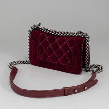 CHANEL, a burgundy quilted velvet 'Small Boy Bag'.