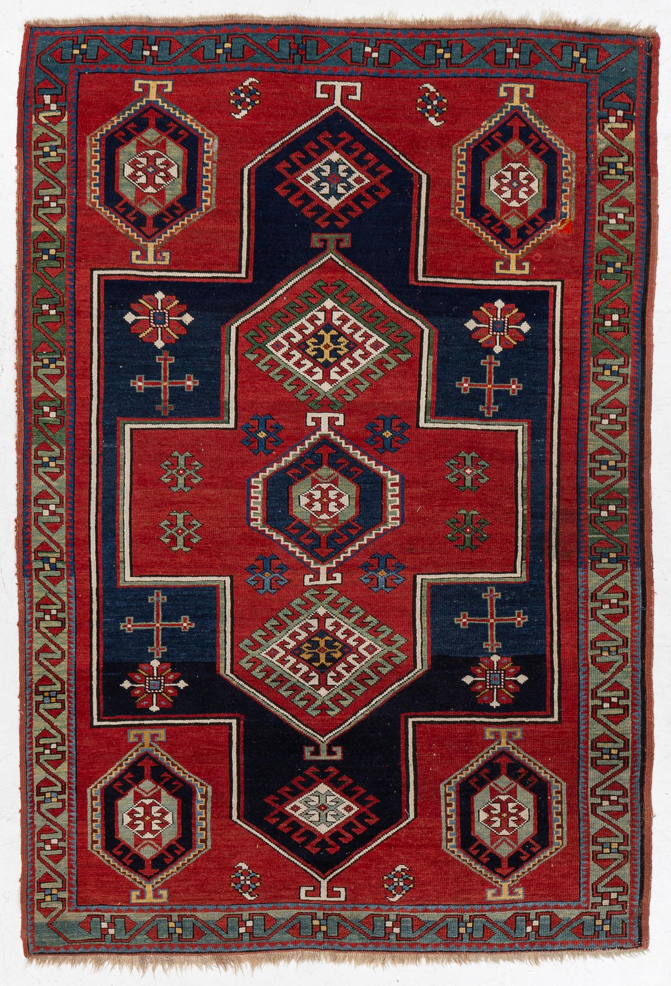 An antique Kazak rug, South Caucasus, c 212 x 147 cm.