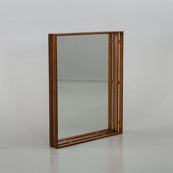 A TEAK MIRROR, 1960s, back marked Royal Board, Made in Sweden.