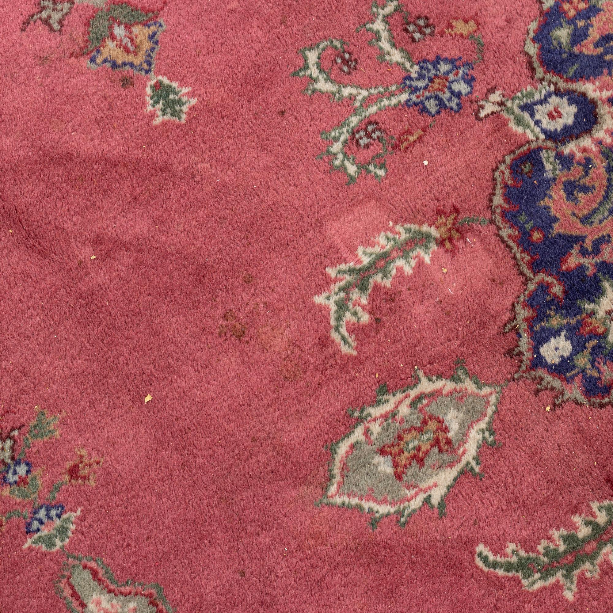 An oriental/eastern European carpet, c. 355 x 275 cm.