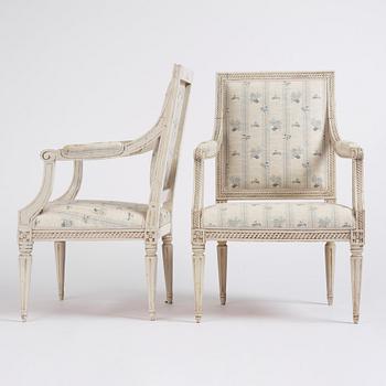 A pair of Gustavian open armchairs by J. Lindgren (master in Stockholm 1770-1800).