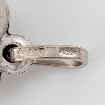 Four pendants with diamonds, and a pair of earrings with rose quartz, 18K gold and white gold.