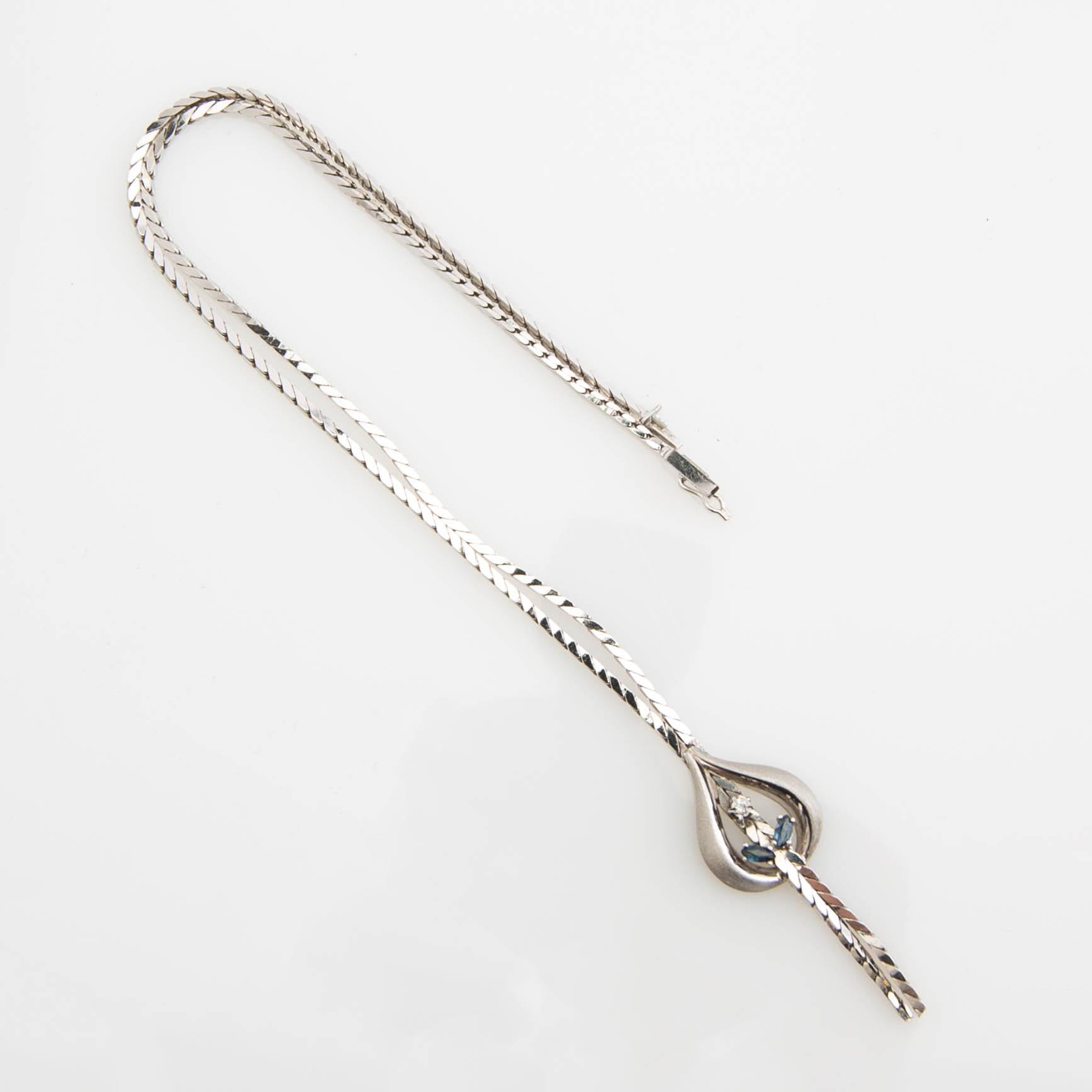 Necklace, 14K white gold with sapphires and diamond.