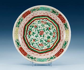 1339. A sancai glazed charger, Qing dynasty, six characters mark and period of Kangxi (1662-1722).