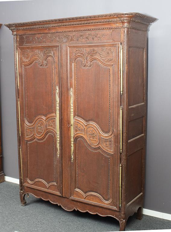 A french carved wooden cabinet, around 1900.