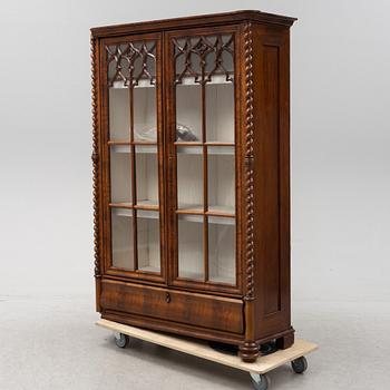 A mahogany veneered Gothic Revival cabinet, second half of the 19th Century.