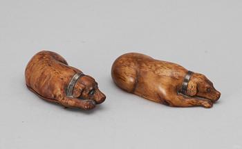 Two 19th - 20th century birch snuffboxes in the shape of lying dogs.