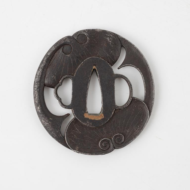 A round iron tsuba, mei, Edo-period.