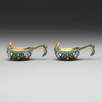 A pair of Russian silver-gilt and enameled kovsch/salts, unidentified makers mark, Moscow 1899-1908.