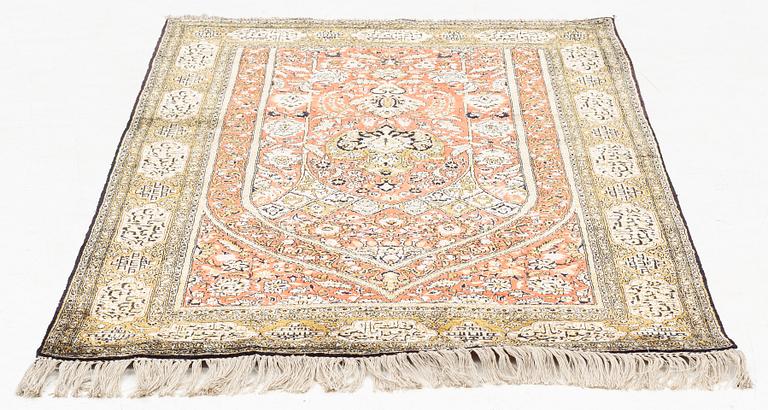 A rug, silk Quum, ca 174 x 103 cm.