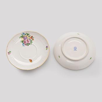 A pair of Herend porcelain candlesticks, and a lidded sugar bowl, Hungary.
