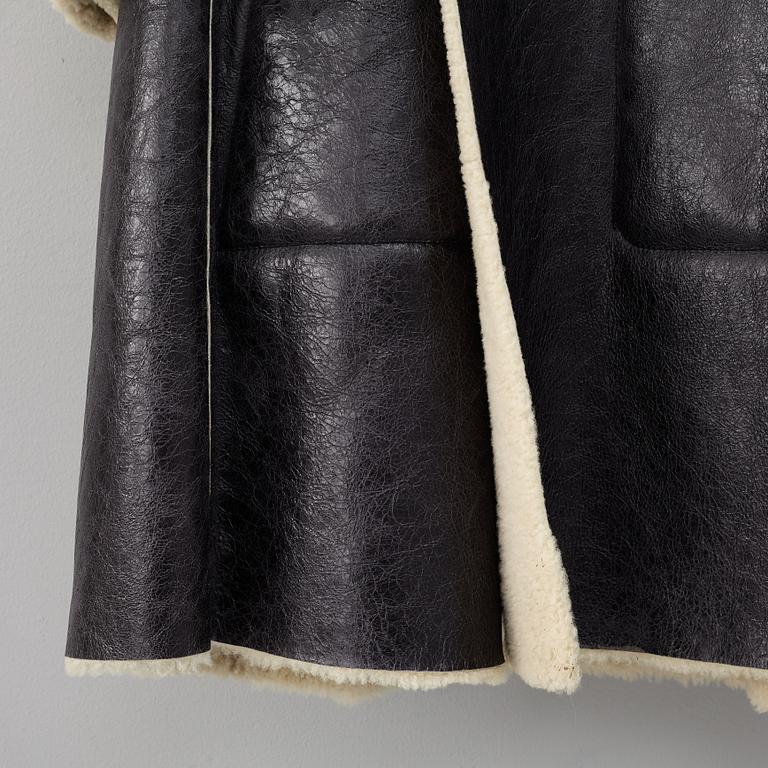 Yves Saint Laurent, Rive Gauche, rock, made in Italy, circa 2000.