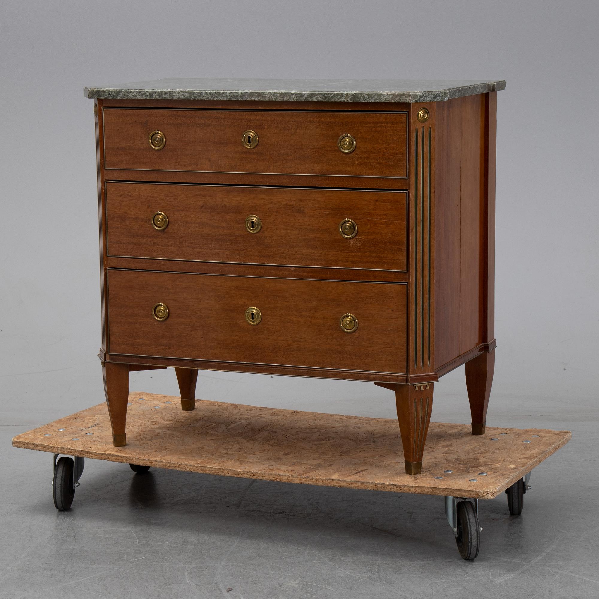 A gustavian style chest of drawers from the second half of the 20th century.