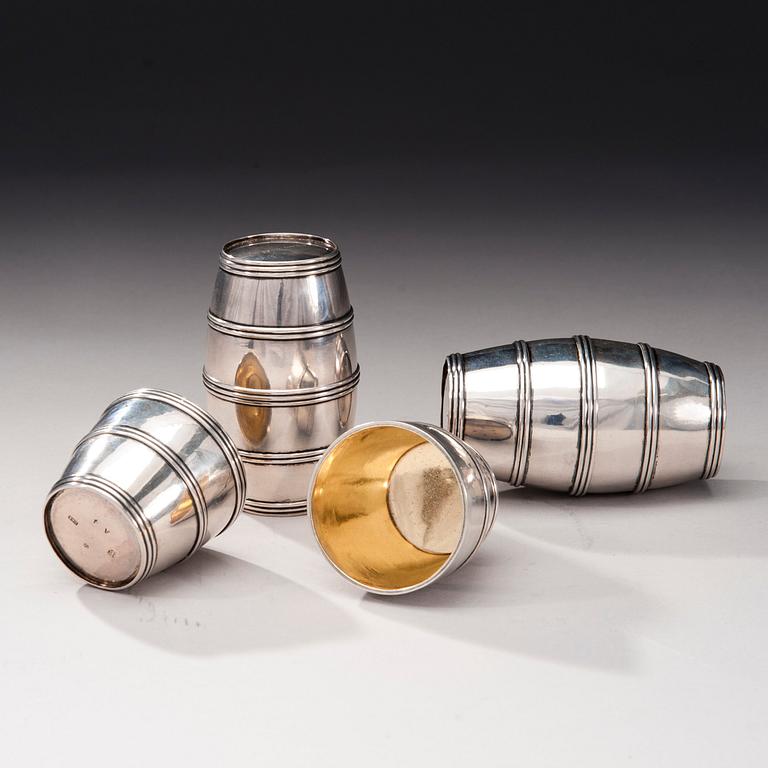 A SET OF THREE BARREL BEAKERS.