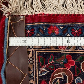 A rug, Ghom, circa 206 x 136 cm.