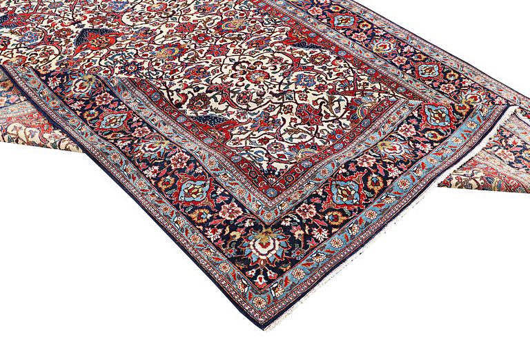 A semi.antique Kashan, c. 319 x 212 cm.