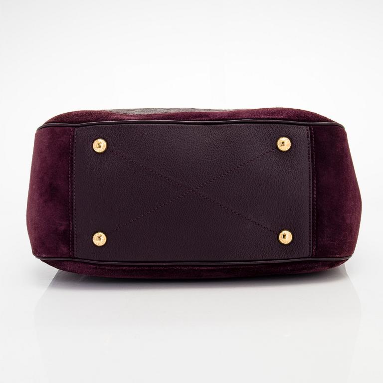 Louis Vuitton, a Monogram Empreinte 'Audacieuse' bag.
