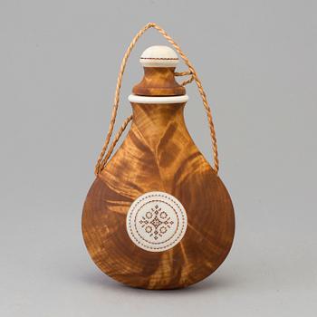 a traditional sami salt bottle by Tore Sunna.