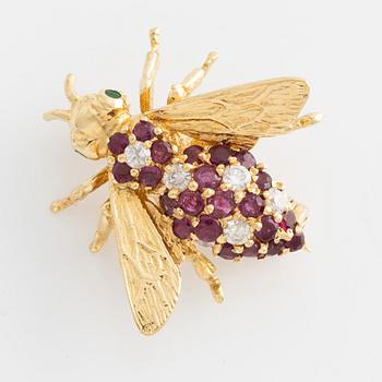 Brooch, Strömdahls, 18K gold with rubies, emeralds, and brilliant-cut diamonds, in the shape of a bee.