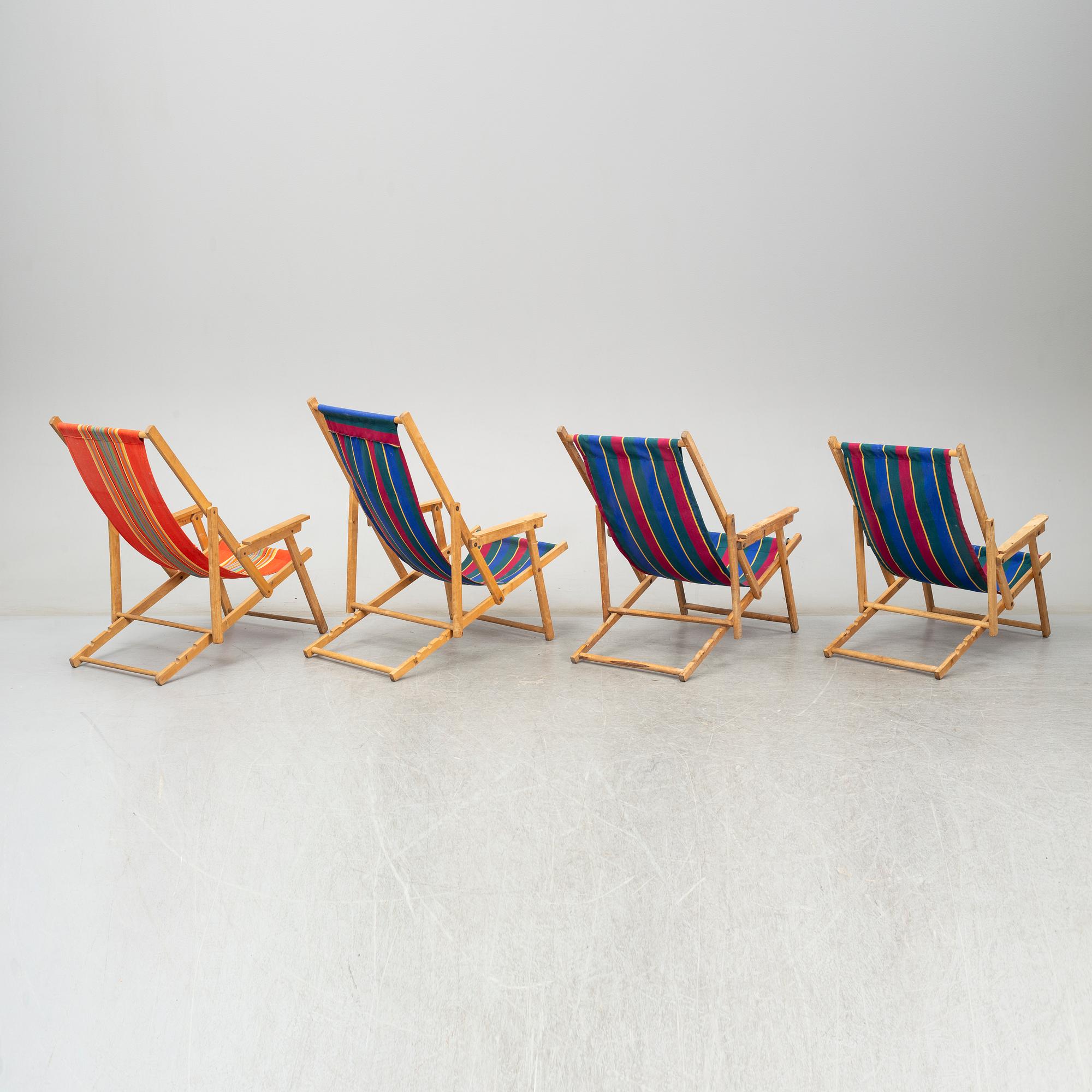 Four collapsible birch deck chairs, mid-late 20th Century.