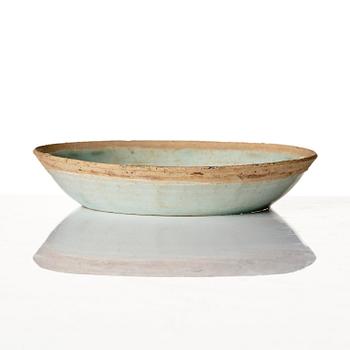 A qingbai dish with moulded decoration in pale celadon glaze, Southern Song dynasty (1127–1279).