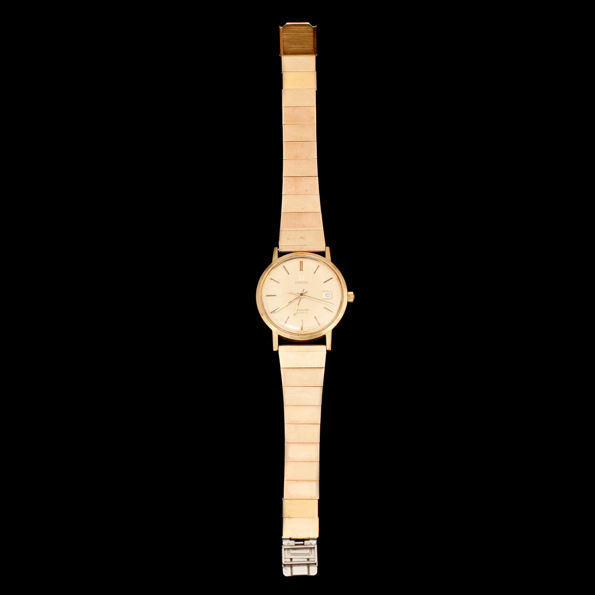 HERRARMBANDSUR, 18 k, Omega Seamaster Quartz.
